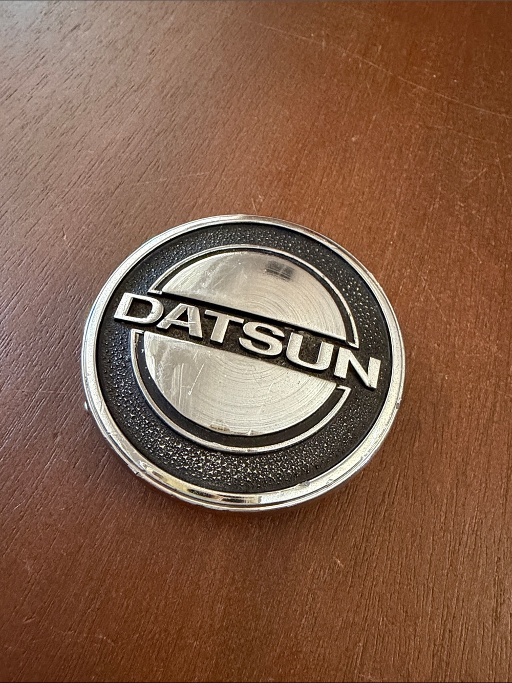 Vintage DATSUN belt buckle // 3” round // 1980s